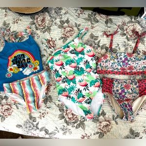 3 bathing suits, size 7/8, 2 bikinis, 1 one piece, barely used